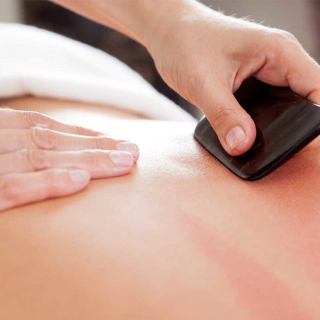 TCM-Therapie Guasha Reibe-Massage